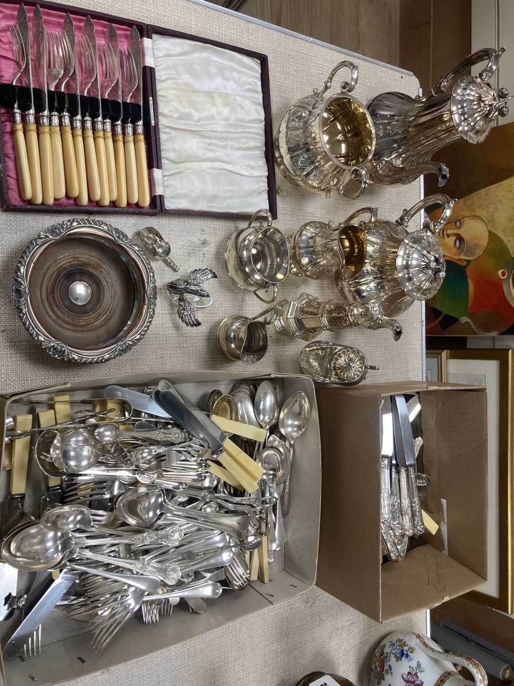 A Victorian silver plated four piece tea set, assorted plated flatware,etc.